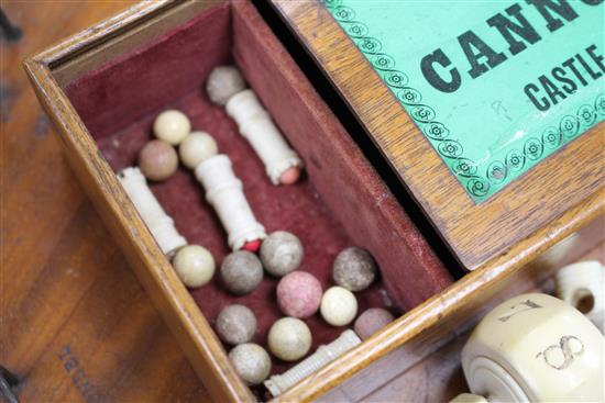 A rare mid 19th century Jaques of London Game of Cannonade of Castle Bagatelle, comprising a circular mahogany board, 38cms diameter,